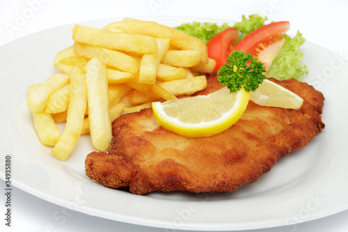 Photo: Schweineschnitzel Wiener Art mit Pommes frites Schweineschnitzel Wiener Art mit Pommes frites