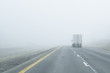 Semi-Truck Drives Into Dense Fog