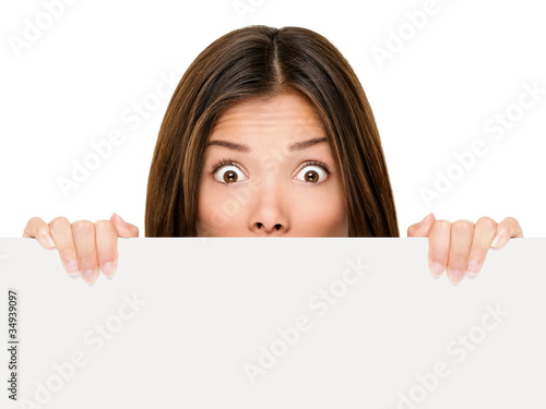 Photo: Banner sign woman peeking over edge Banner sign woman peeking over edge