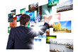 Man working with vurtial screens