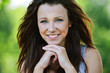 portrait of beautiful dark-haired smiling girl
