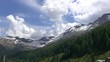 Ziehende Wolken, verschneite Berge, Engadin (Schweiz) Zeitraffer
