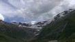 Ziehende Wolken, Berge, Tal im Engadin (Schweiz) in Zeitraffer