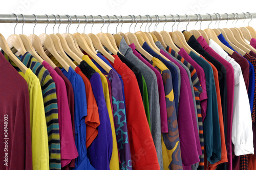 Photo: fashion clothing on hangers at the show fashion clothing on hangers at the show