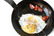 Fried eggs in pan