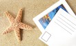 blank postcard on sand