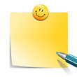 Notizzettel mit Stift und Smiley