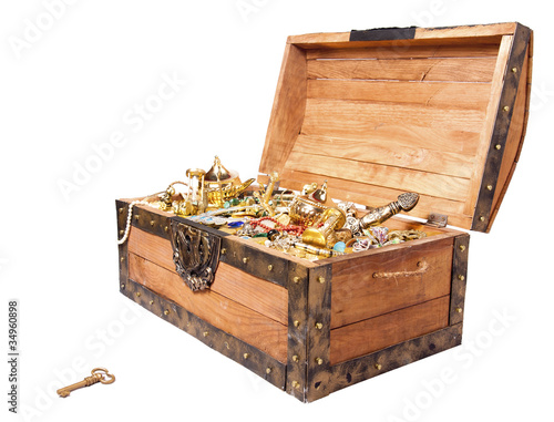 Photo: treasure chest with key isolated on white treasure chest with key isolated on white