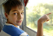 Boy portrait by train window