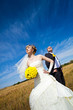 Beautiful couple on the yellow field