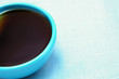 Photo: closeup of a blue coffee cup closeup of a blue coffee cup
