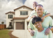 Attractive African American Family in Front of Home