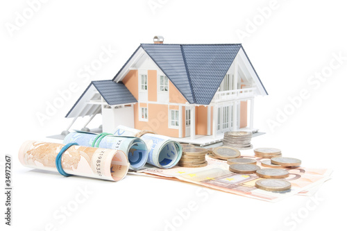 Photo: Home finances - house and money Home finances - house and money