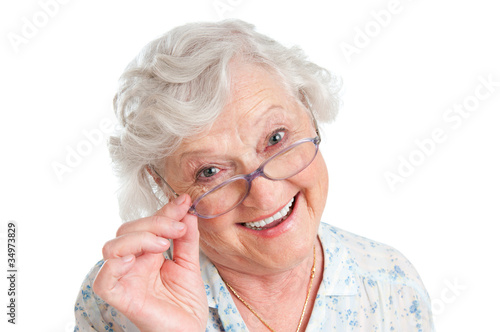 Photo: Satisfied senior woman with eyeglasses Satisfied senior woman with eyeglasses