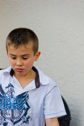 Photo: pouting young boy pouting young boy