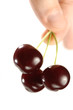 Three Cherries in a Hand