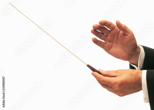 Photo: Conductor conducting an orchestra Conductor conducting an orchestra