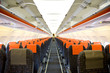 Raw seats inside an airplane.
