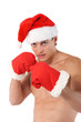 Photo: Sexy muscular man wearing a Santa Claus hat Sexy muscular man wearing a Santa Claus hat