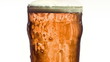 Overflowing glass of beer