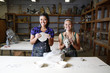 Women working with clay in artist studio