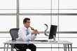 Pacific Islander businessman charming snake