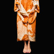 Mixed race woman in Asian robe