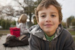 Mixed race boy smiling outdoors