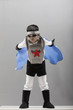 Korean boy in superhero costume flying