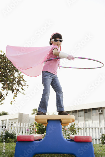 Photo: Korean girl in superhero costume and hula hoop Korean girl in superhero costume and hula hoop