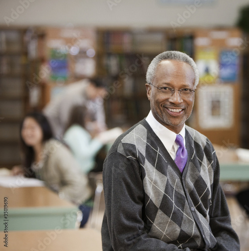 Photo: Black librarian in school library Black librarian in school library