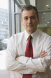 Caucasian businessman with arms crossed