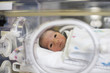 Hispanic baby in intensive care unit