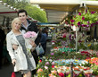 Caucasian couple shopping in market