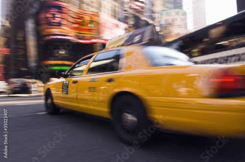 Photo: Speeding taxi in city Speeding taxi in city