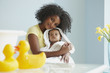 Mother drying baby off with towel