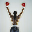 Boxer standing with hands raised