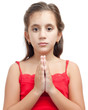 Latin girl praying isolated on a white background