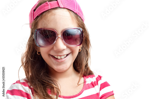 Photo: Portrait of a trendy latin girl with sunglasses Portrait of a trendy latin girl with sunglasses