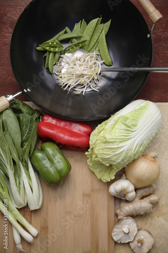 Photo: Variety of Asian stir fry ingredients and wok Variety of Asian stir fry ingredients and wok
