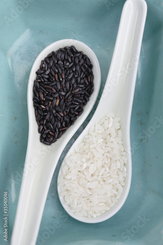 Photo: Black and white rice on spoons Black and white rice on spoons
