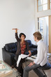 Architects discussing blueprints in office
