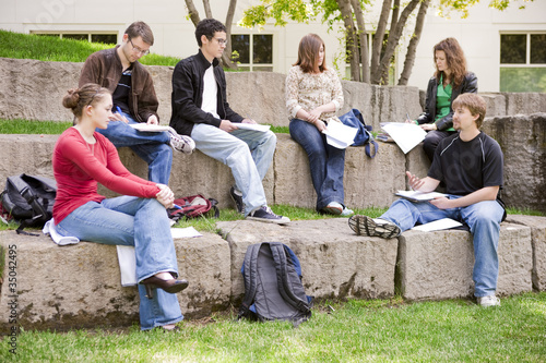 Photo: Students studying together outdoors Students studying together outdoors