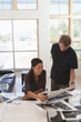 Business people working in art gallery