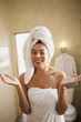 Mixed race woman in towel in the morning