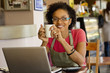 African American small business owner in shop