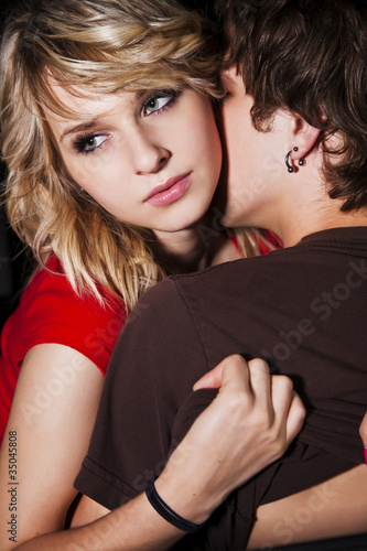 Photo: Caucasian couple hugging Caucasian couple hugging