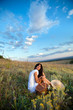 yong woman on the rural summer background
