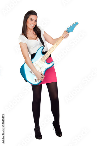 Photo: Attractive girl with a blue electric guitar Attractive girl with a blue electric guitar