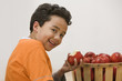 Hispanic boy eating apple